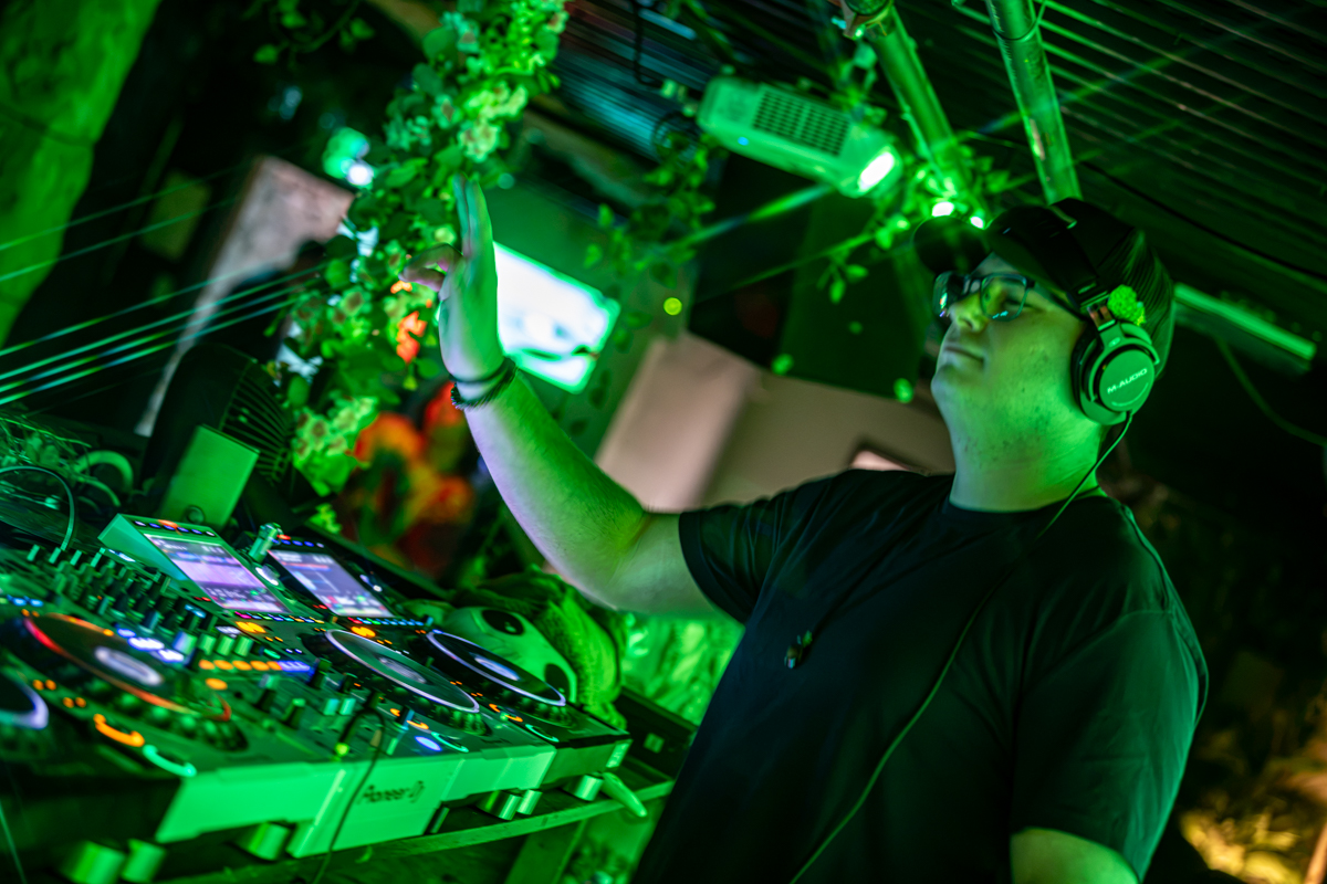 Ember Audio at the decks under green lights
